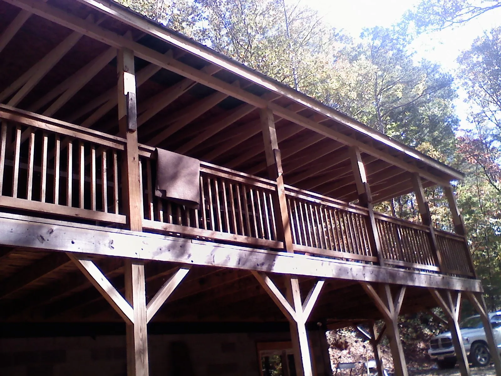 Timber framing under a new elevated porch and deck — Roof Leak Repair in West Lebanon by Roofing Brothers